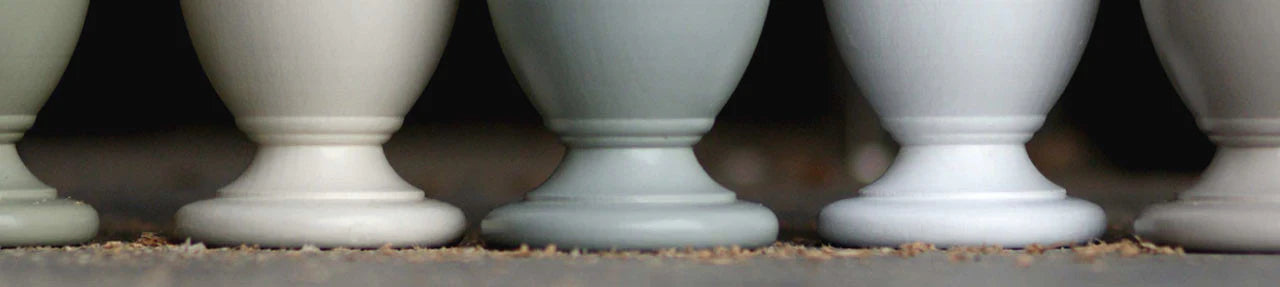 slection of Farrow and Ball painted wood curtain pole finials