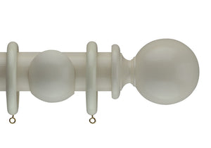 Product Image - Showing cream curtain pole with a Millfield finial, ring and bracket pole set assembly.