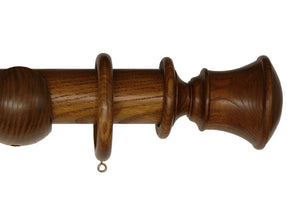 Product Image - Showing dark oak curtain pole with a Orton finial, ring and bracket pole set assembly.