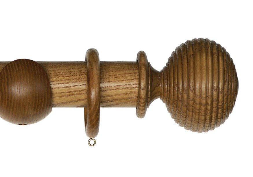 Product Image - Showing light oak curtain pole with a Langton finial, ring and bracket pole set assembly.