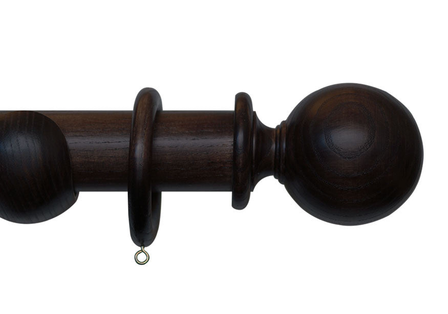 Product Image - Showing walnut curtain pole with a Millfield finial, ring and bracket pole set assembly.