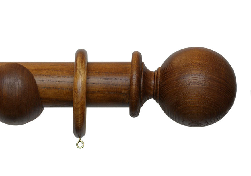 Product Image - Showing dark oak curtain pole with a Millfield finial, ring and bracket pole set assembly.