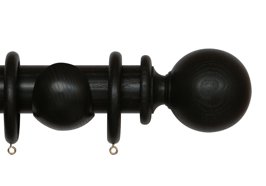 Product Image - Showing black curtain pole with a Millfield finial, ring and bracket pole set assembly.